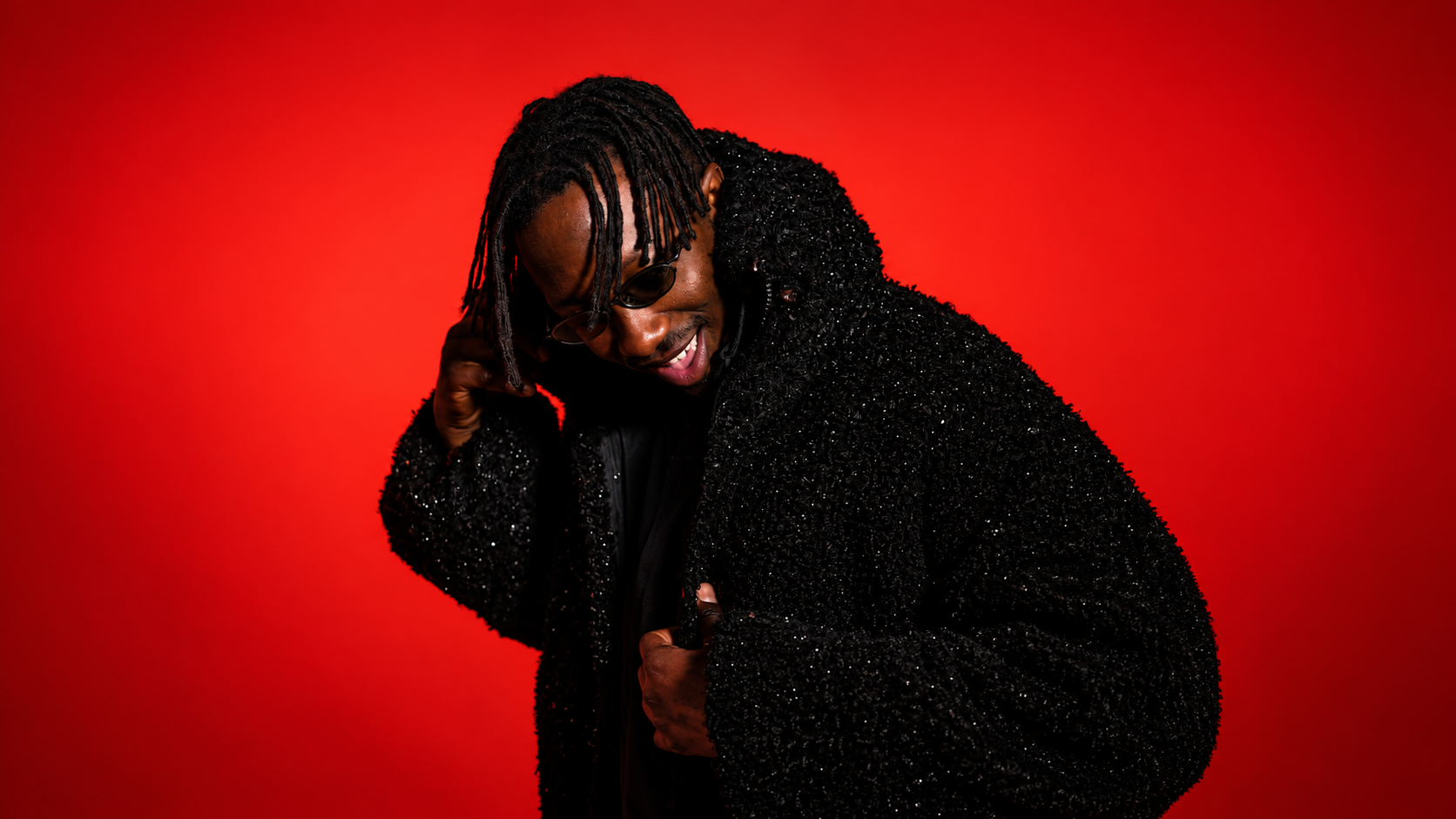 ameme-press-photo-red-background